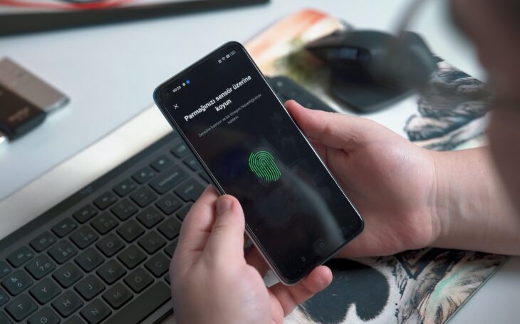 biometric fingerprint scanner on smartphone for payment authentication.