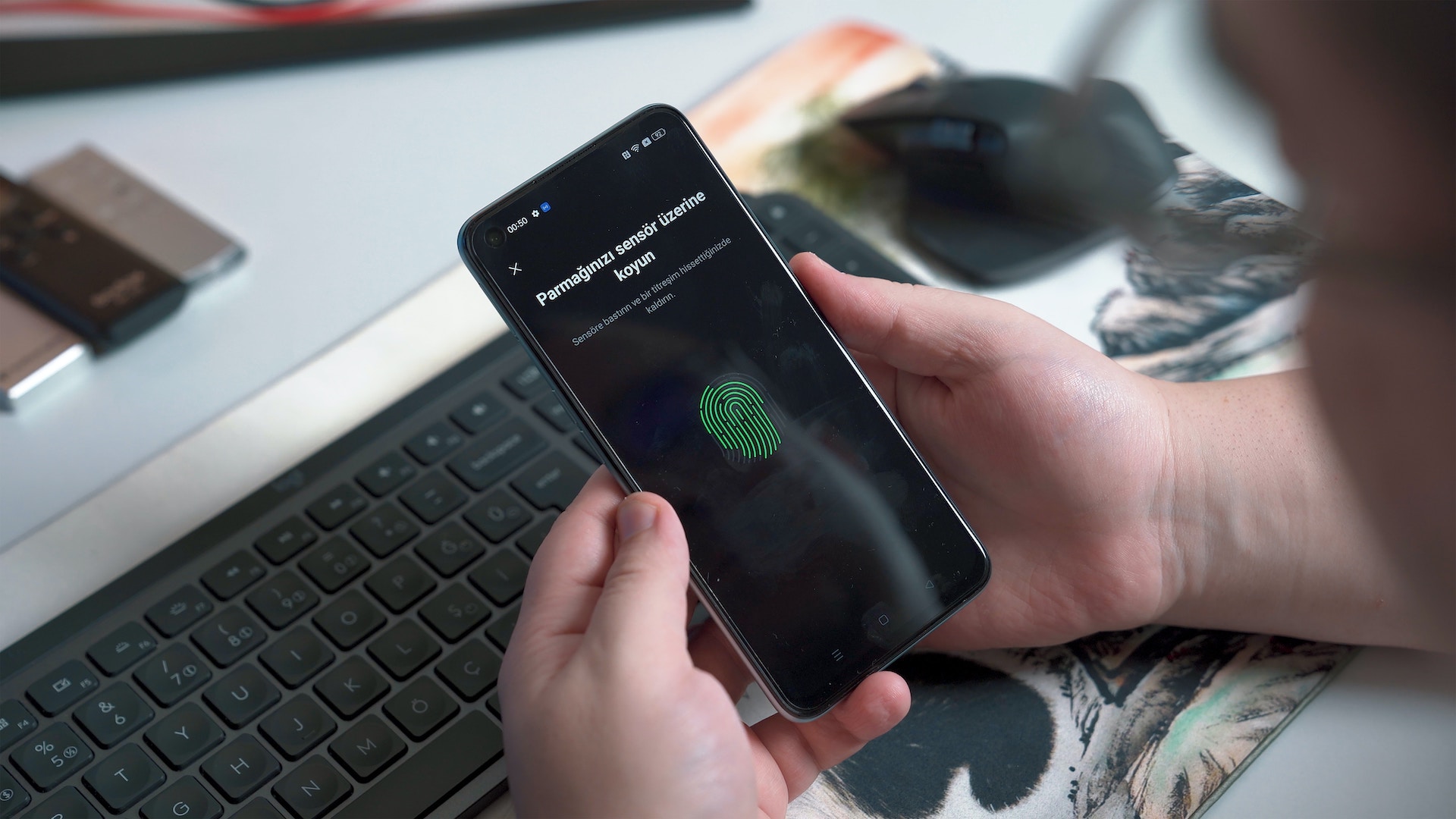 biometric fingerprint scanner on smartphone for payment authentication.